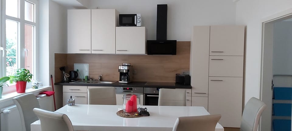 Apartment, 4 Bedrooms | Private kitchen | Fridge, microwave, oven, stovetop