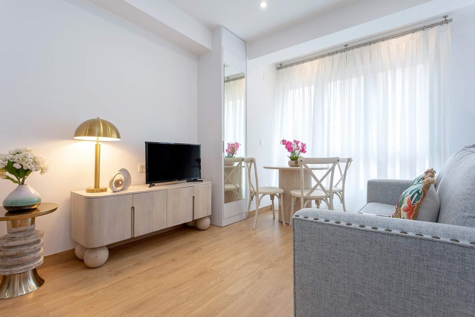 Apartment (1 Bedroom) | Living area | 32-inch TV with cable channels