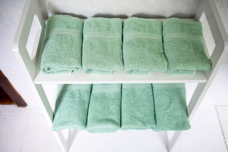 Traditional House | Bathroom amenities | Shower, hair dryer, slippers, towels
