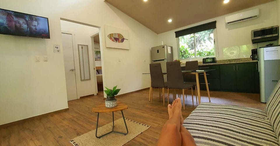 Deluxe Villa | Living area | Flat-screen TV