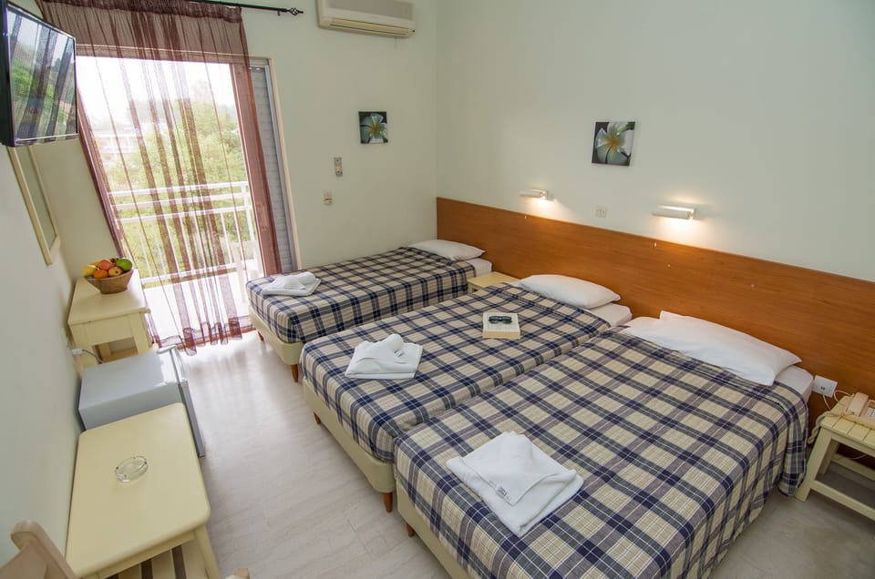 Standard Triple Room | Premium bedding, pillowtop beds, minibar, in-room safe
