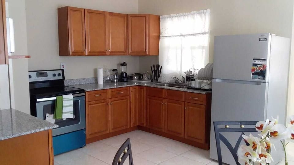 Townhome | Private kitchen | Coffee/tea maker, fridge, microwave, stovetop