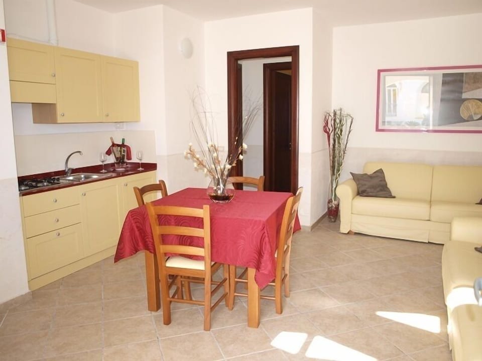 Apartment (Pool Zone) | Living area | 22-inch flat-screen TV with satellite channels, TV