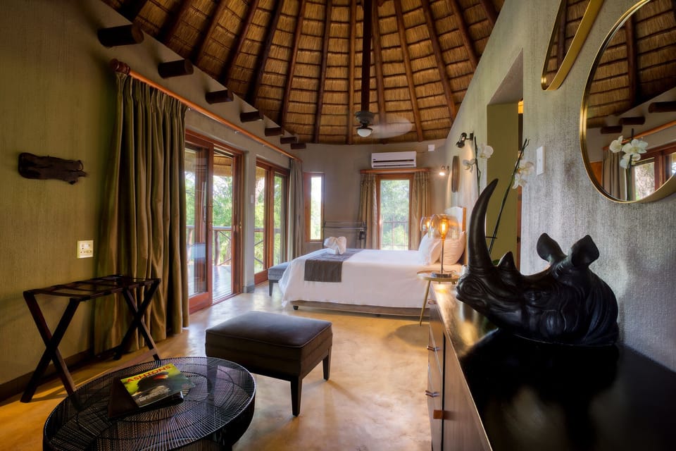 Deluxe Chalet, Patio, River View (Rondawel 1) | Minibar (free items), in-room safe, iron/ironing board (on request)