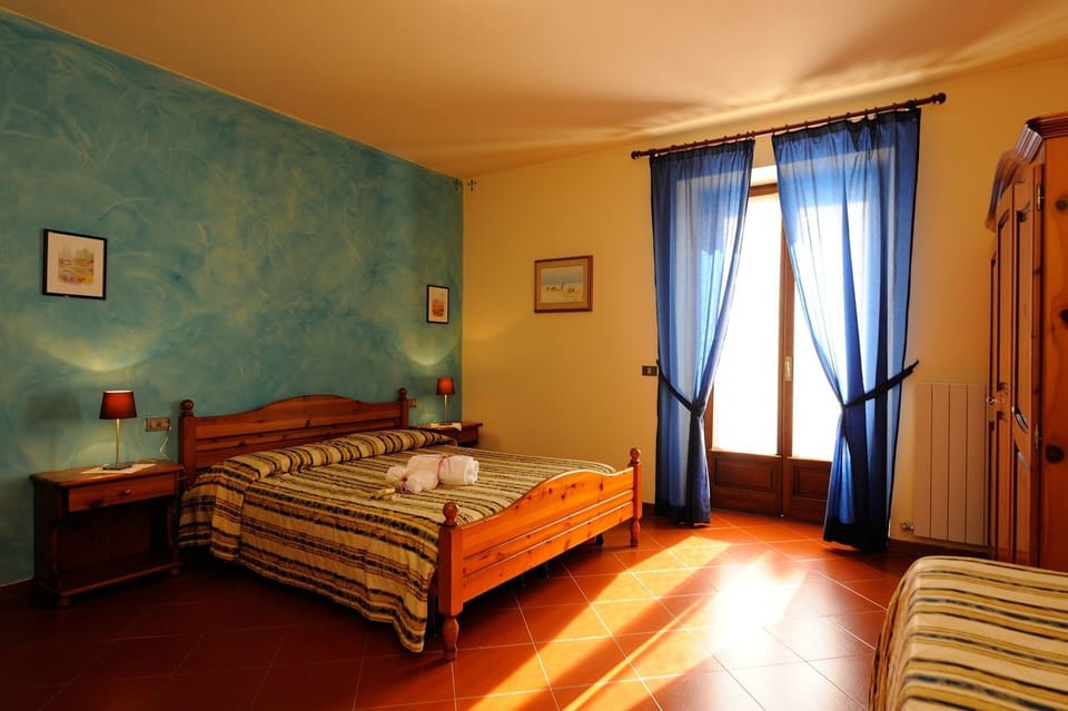 Apartment, 2 Bedrooms | Desk, blackout drapes, iron/ironing board, free cribs/infant beds