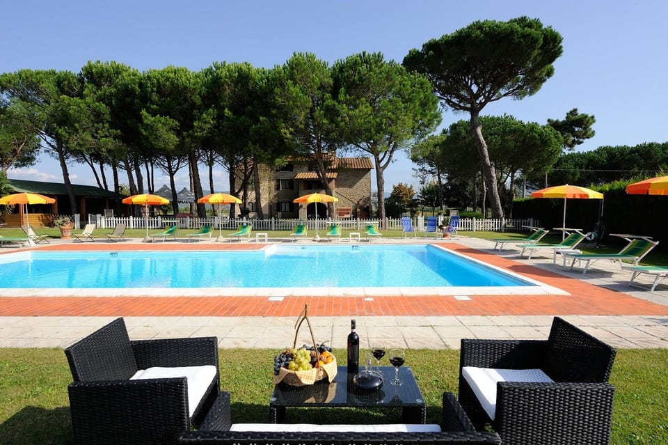 Seasonal outdoor pool, pool umbrellas, sun loungers