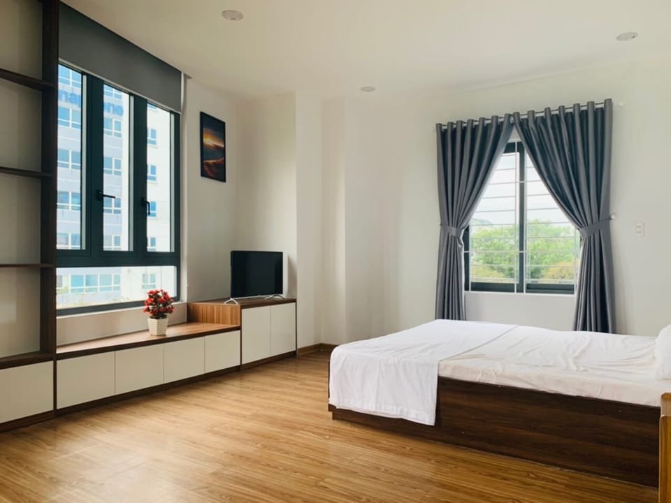 Apartment, 1 Bedroom | Minibar, desk, soundproofing, iron/ironing board