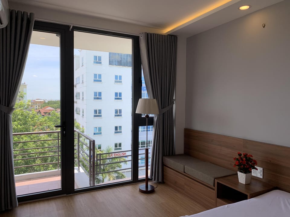 Apartment, 2 Bedrooms | Minibar, desk, soundproofing, iron/ironing board