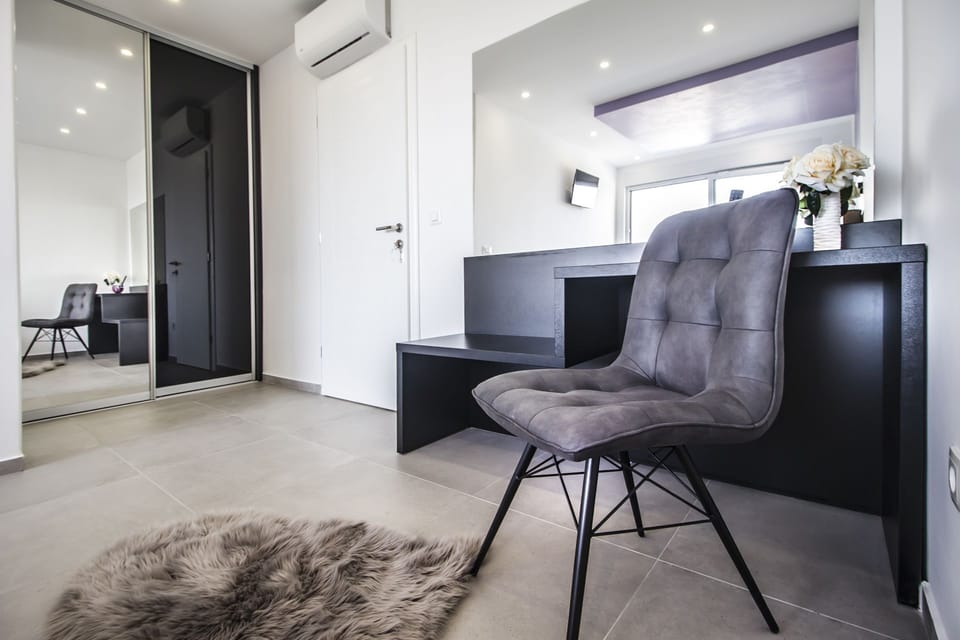 Deluxe Villa | Living area | Flat-screen TV