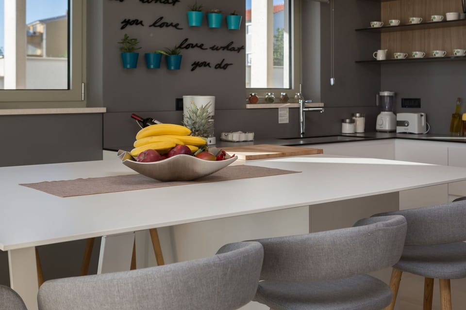 Luxury Villa | Private kitchen | Full-size fridge, microwave, oven, stovetop