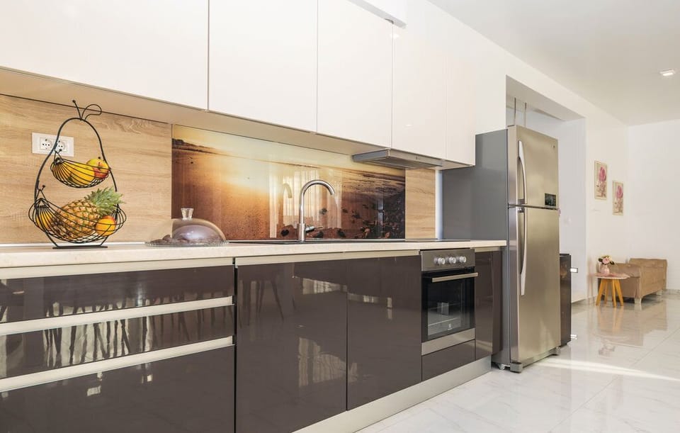 Villa | Private kitchen | Full-size fridge, microwave, oven, stovetop