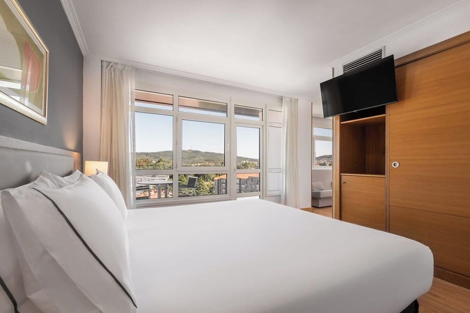 Minibar, desk, laptop workspace, blackout drapes