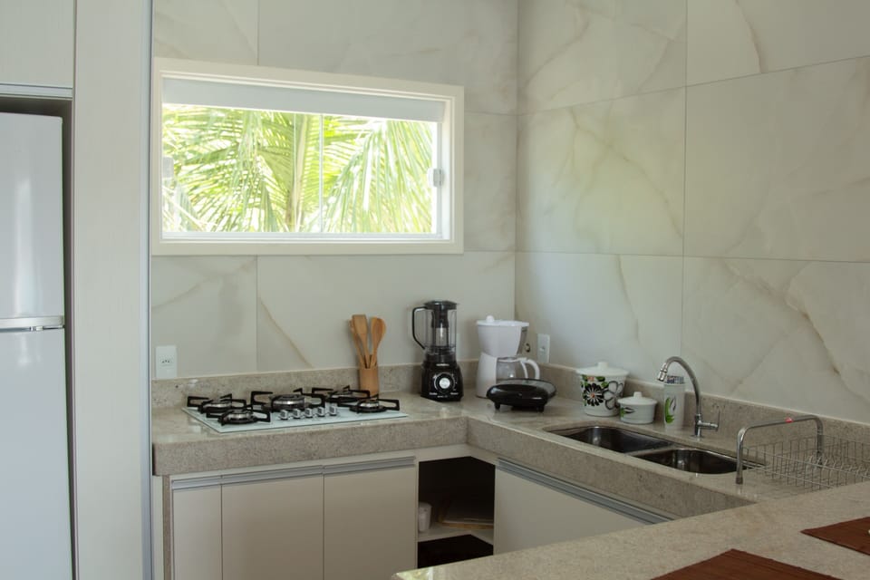 Full-size fridge, microwave, stovetop, coffee/tea maker