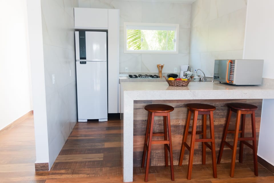 Full-size fridge, microwave, stovetop, coffee/tea maker