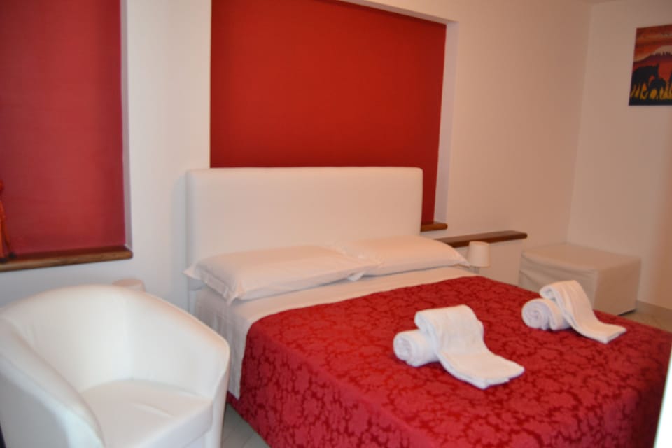 Economy Double Room, Balcony | Premium bedding, down comforters, iron/ironing board, rollaway beds