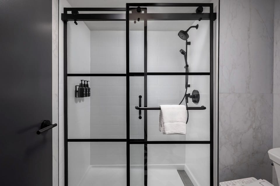 Standard Room, 2 Queen Beds | Bathroom | Shower, rainfall showerhead, free toiletries, hair dryer