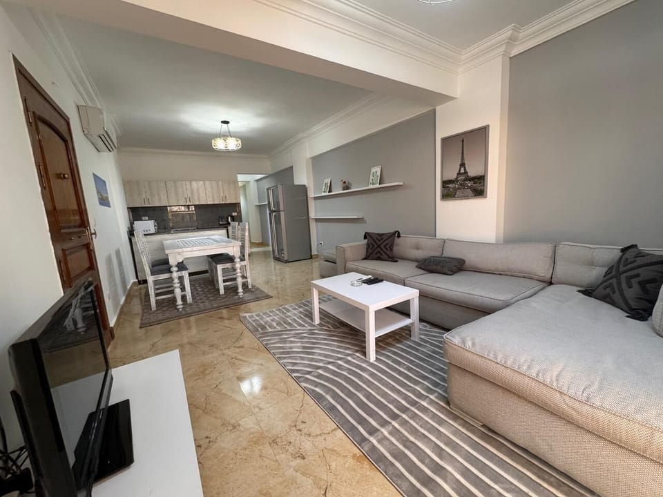Deluxe Two Bedroom Chalet | Living room | 32-inch LCD TV with satellite channels