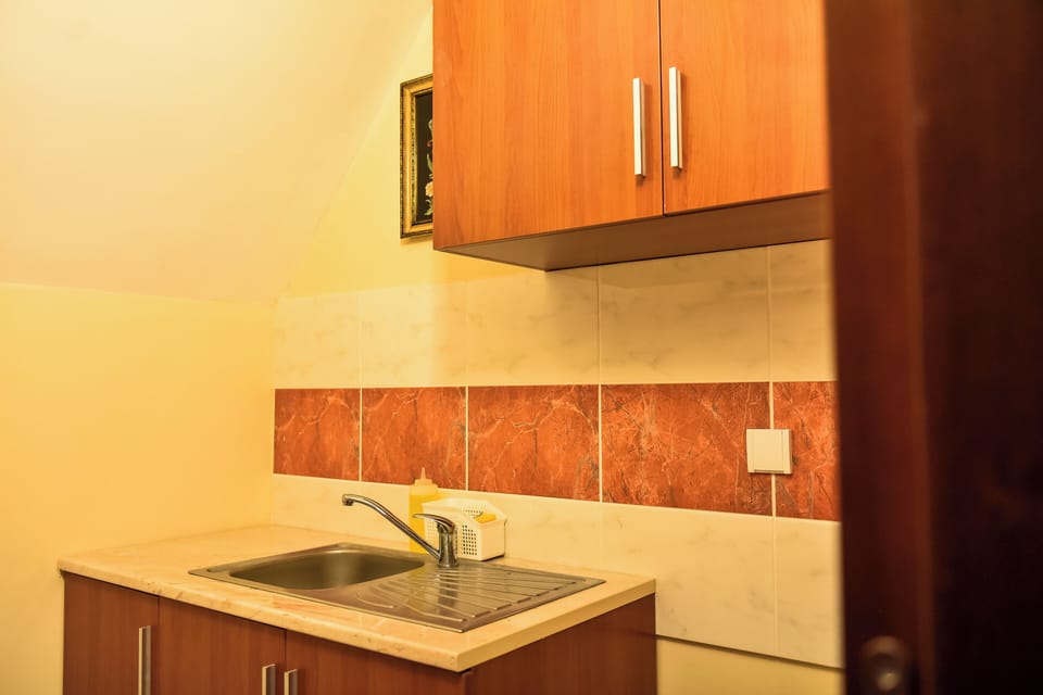 Comfort Apartment | Private kitchen | Electric kettle, coffee grinder