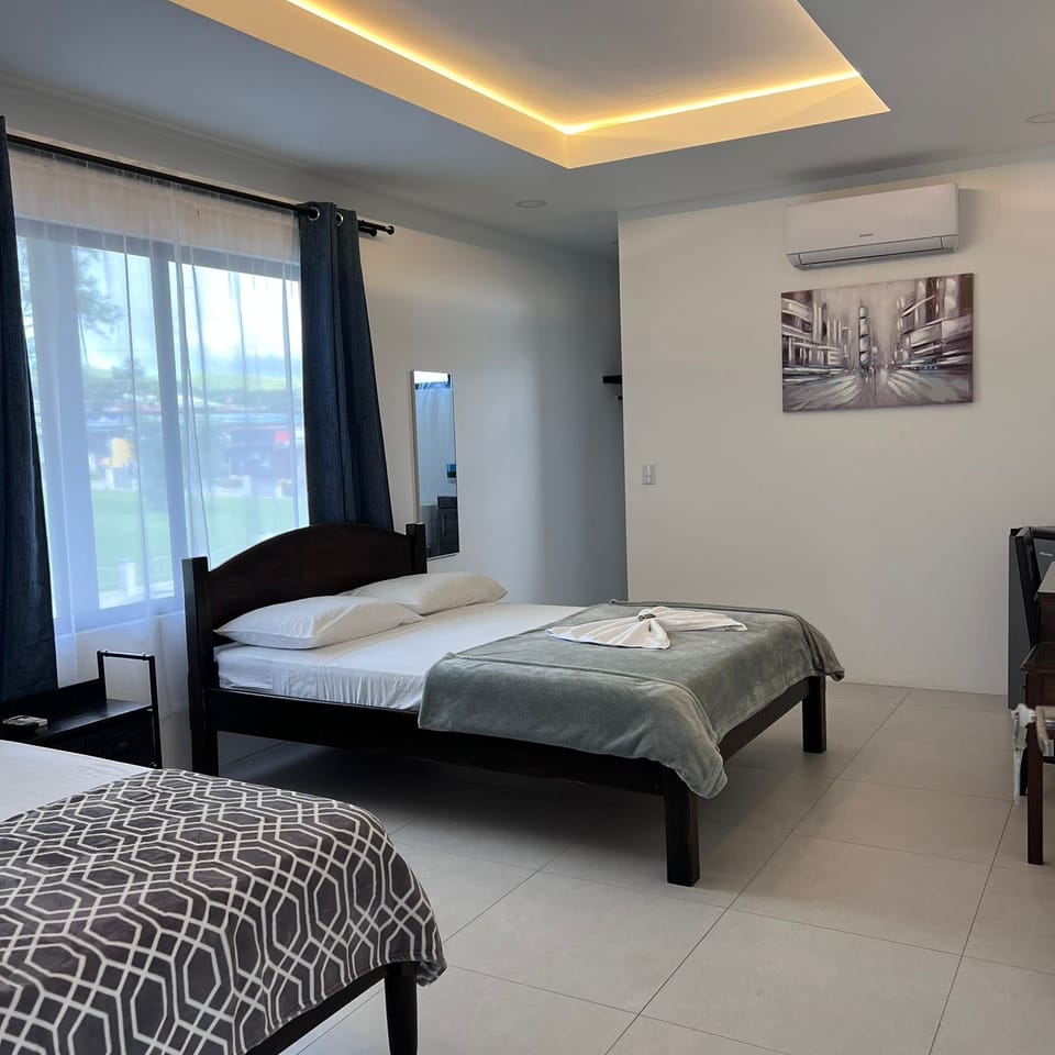 Deluxe Room | Desk, WiFi (free), bed sheets