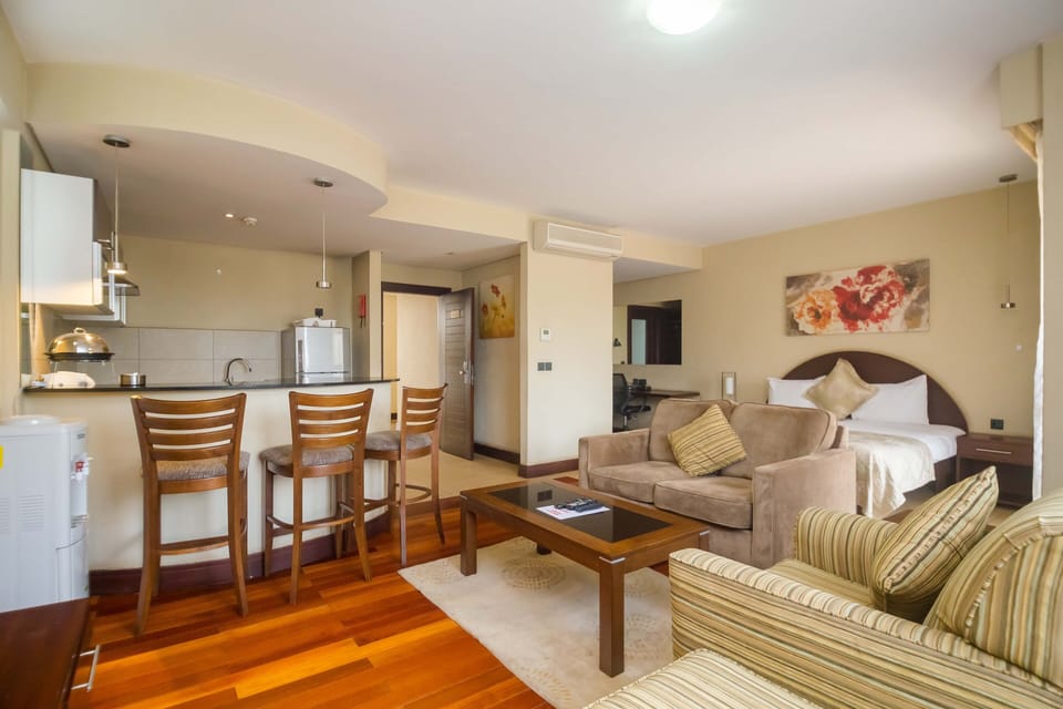 Studio, Balcony | Living room | 42-inch flat-screen TV with cable channels, TV, DVD player