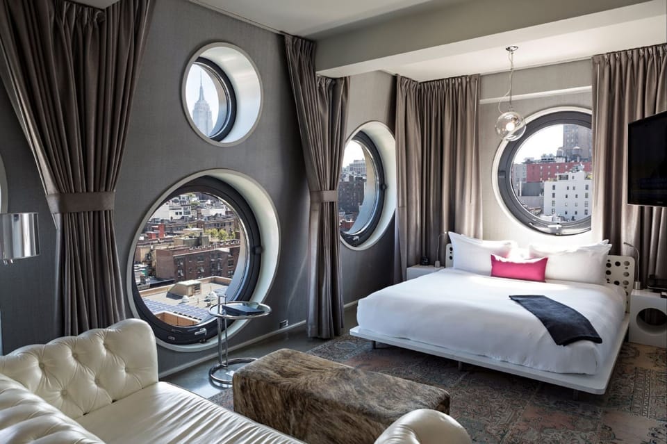 Room, 1 King Bed (Platinum) | Minibar, in-room safe, desk, laptop workspace