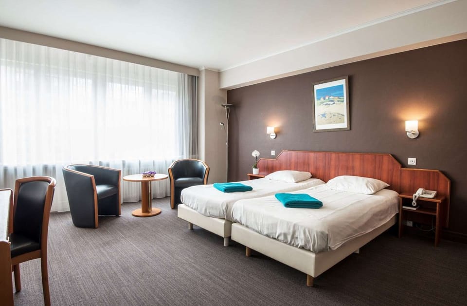 Desk, blackout drapes, free WiFi, bed sheets