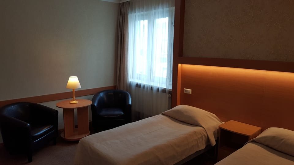 Twin Room | Desk, blackout drapes, soundproofing, iron/ironing board (on request)