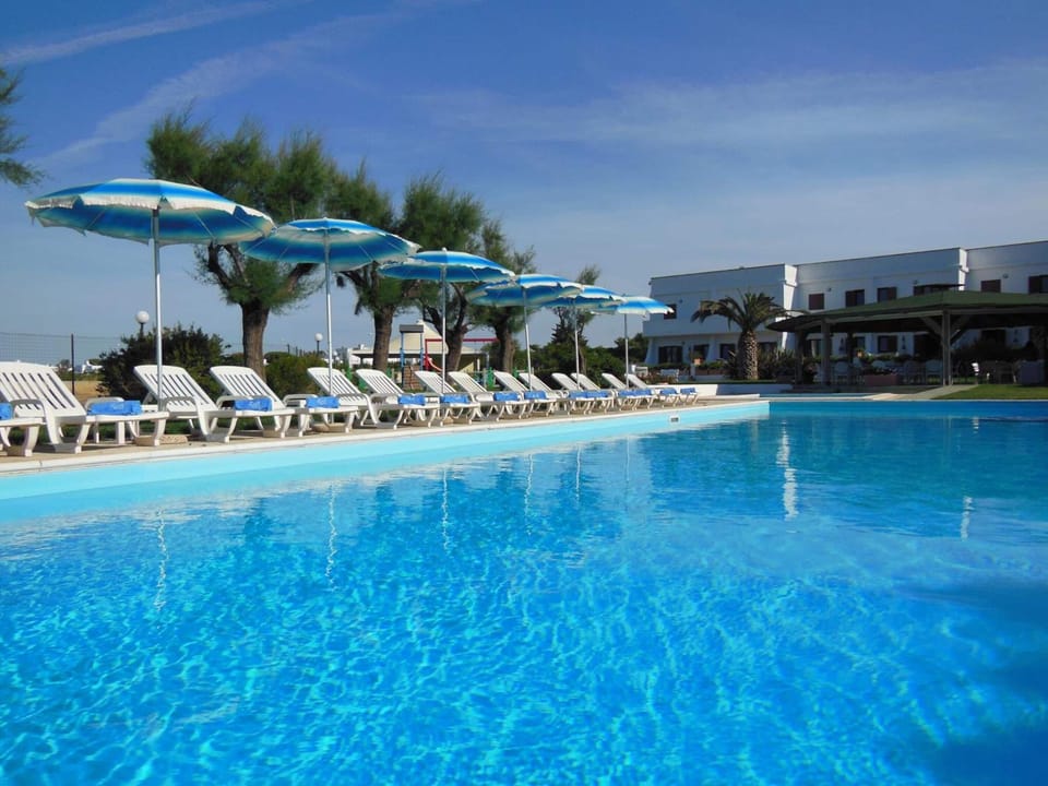 2 outdoor pools, open 9:00 AM to 7:00 PM, pool umbrellas, sun loungers
