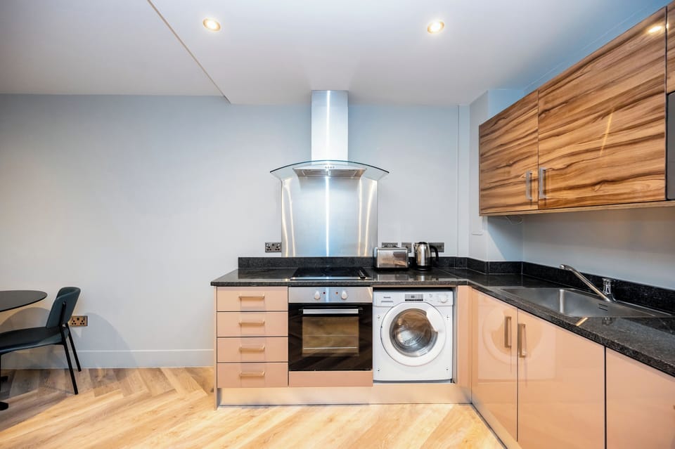 Standard Apartment, 1 Bedroom (Sleeps 4) | Blackout drapes, iron/ironing board, free WiFi, bed sheets