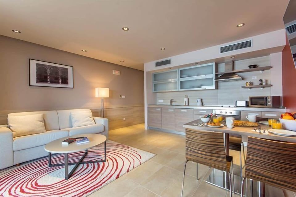 Apartment, Pool Access, Sea View | Private kitchen | Full-size fridge, microwave, oven, stovetop