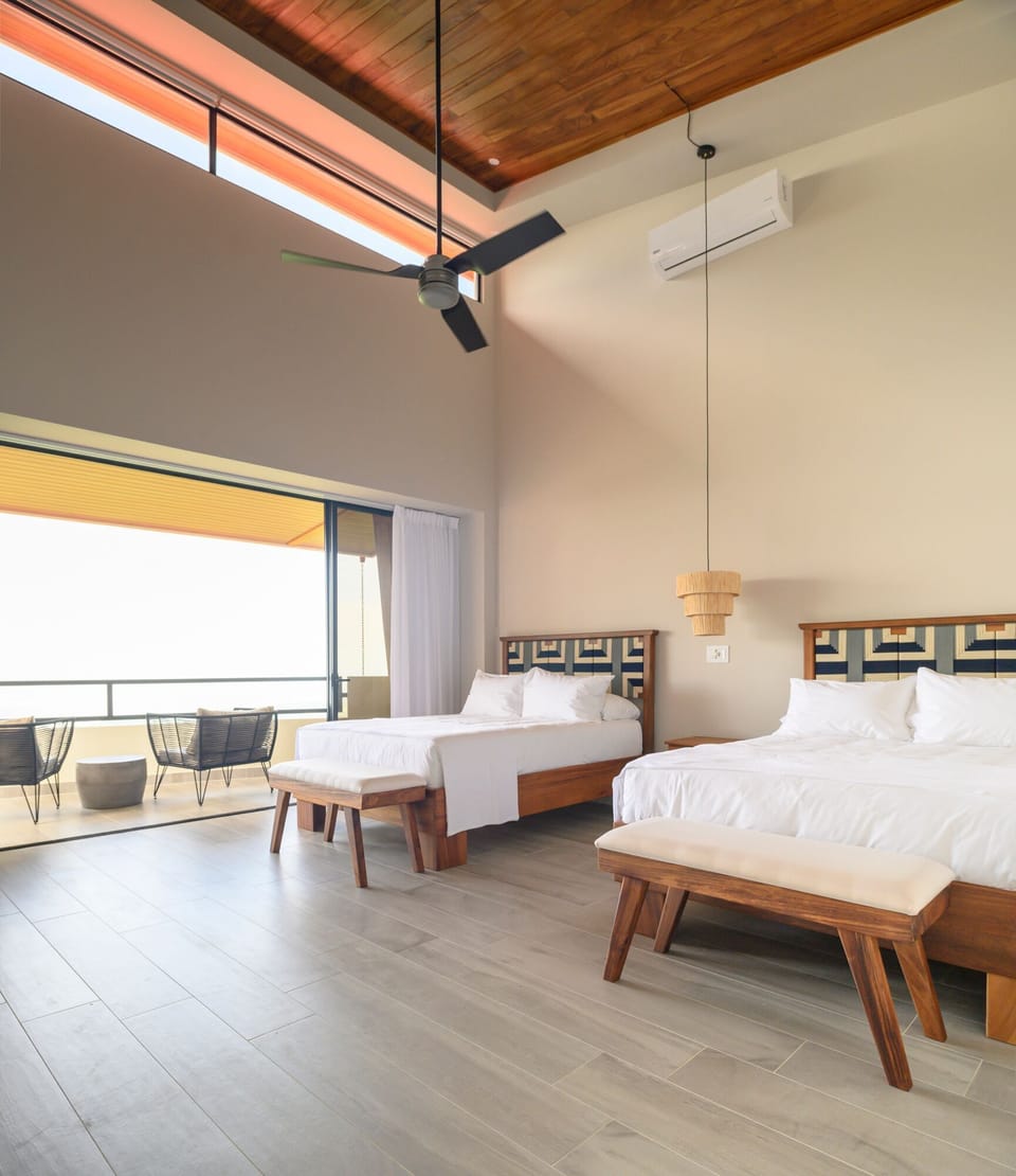 Deluxe Double Room Single Use | Memory foam beds, in-room safe, individually decorated