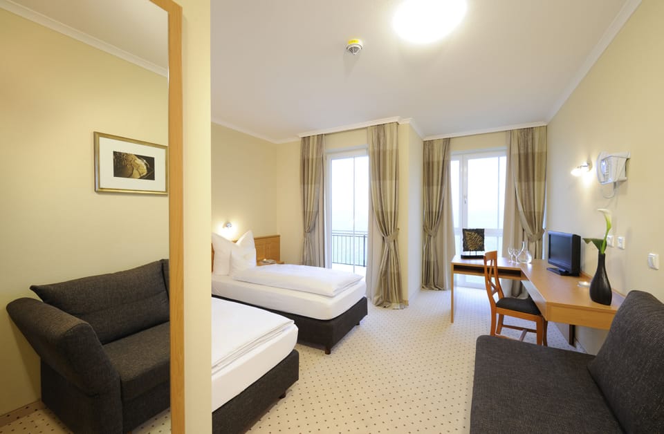 Standard Room, 2 Twin Beds | In-room safe, desk, soundproofing, iron/ironing board