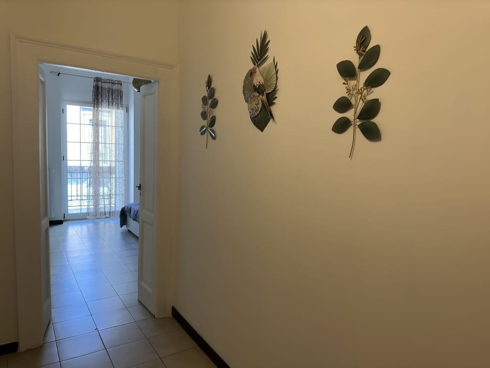 Deluxe Apartment | Living area | 50-inch flat-screen TV with digital channels, TV