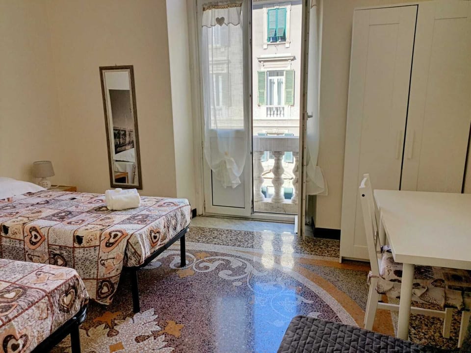 Quadruple Room, Shared Bathroom | Desk, free cribs/infant beds, free WiFi, bed sheets