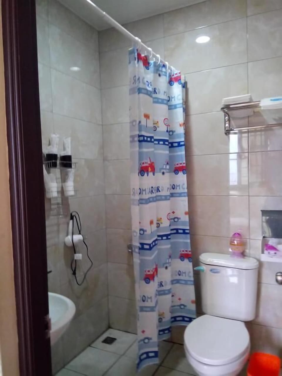 Shower, free toiletries, hair dryer, slippers