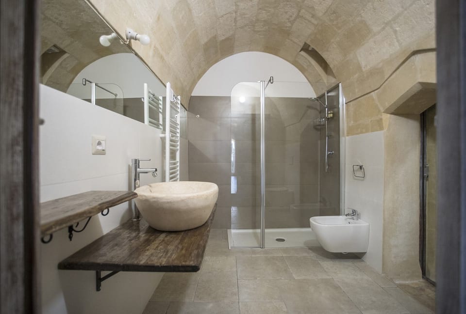 Junior Suite, 1 Bedroom, Balcony | Bathroom | Shower, hair dryer, slippers, bidet