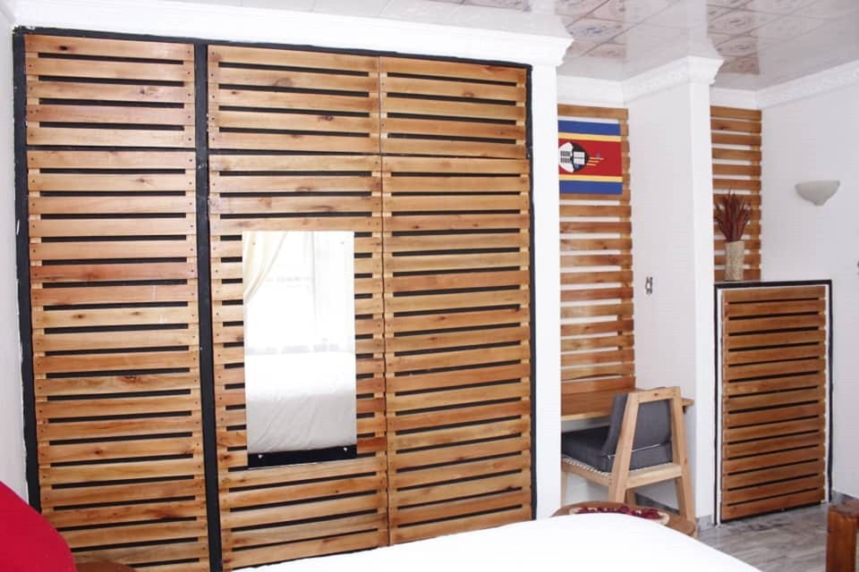 Double Room (Eswatini) | Blackout drapes, iron/ironing board, WiFi (free), bed sheets