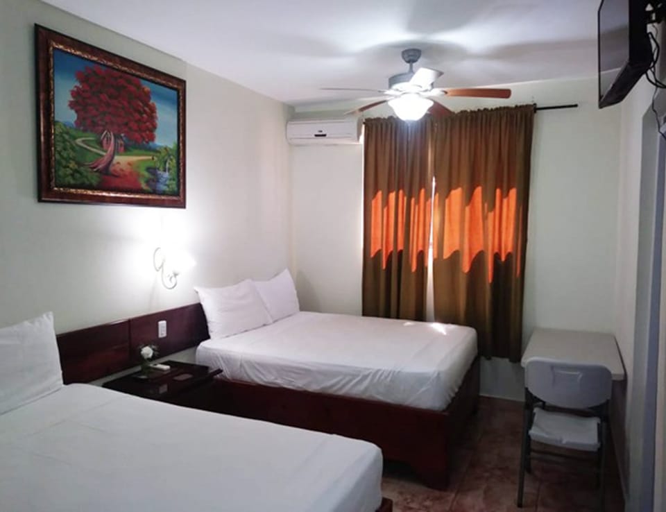 Double Room, 2 Queen Beds | Blackout drapes, free WiFi, bed sheets, wheelchair access