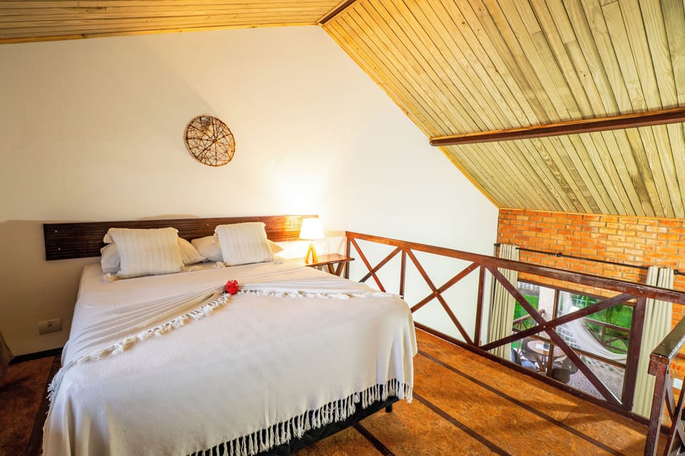 Executive Quadruple Room | Minibar, blackout drapes, free WiFi, bed sheets