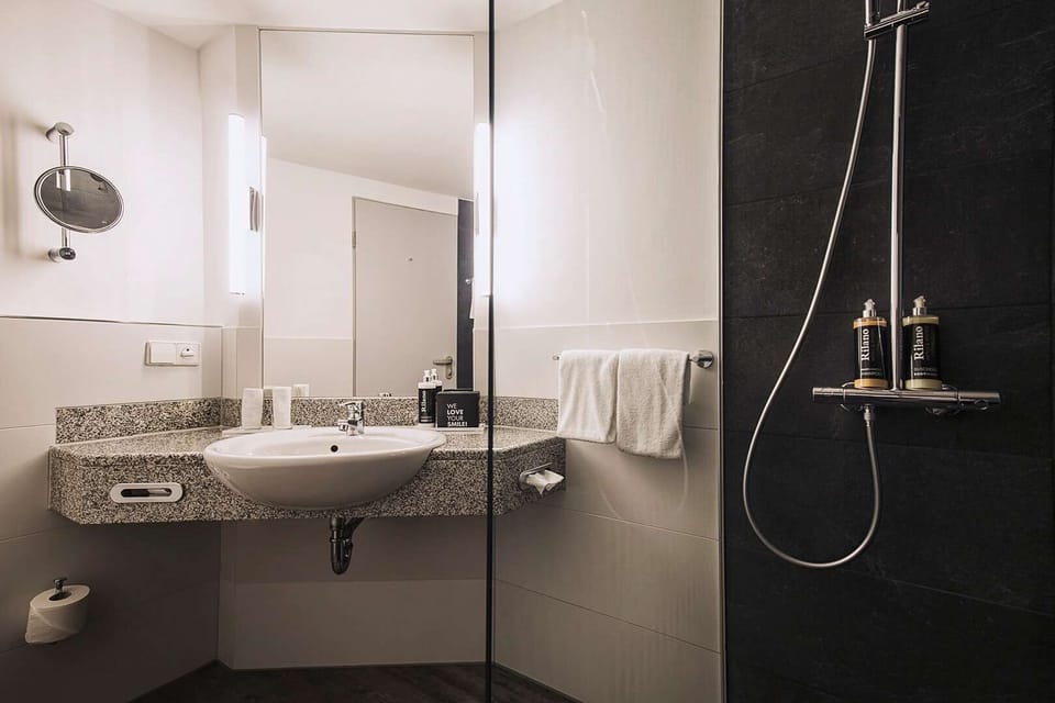 Combined shower/tub, free toiletries, hair dryer, bathrobes