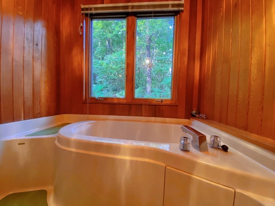 Villa | Bathroom | Hair dryer, slippers, electronic bidet, towels