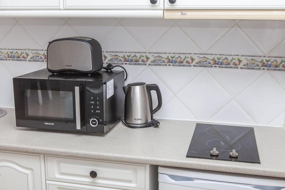 Fridge, microwave, cookware/dishes/utensils