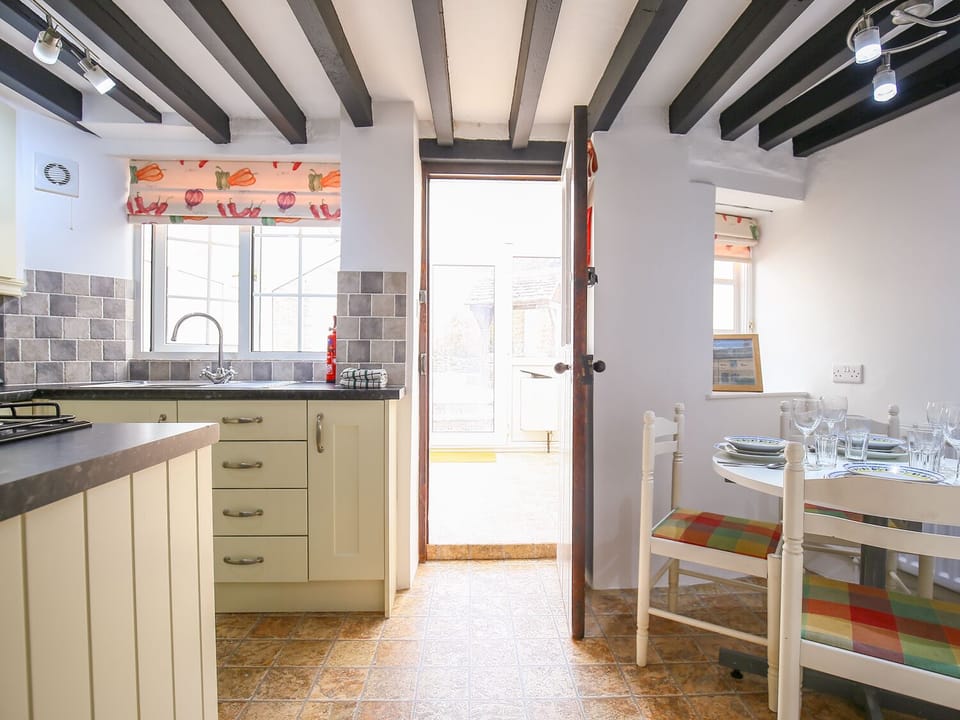 Cottage | Private kitchen | Fridge, microwave, stovetop, highchair