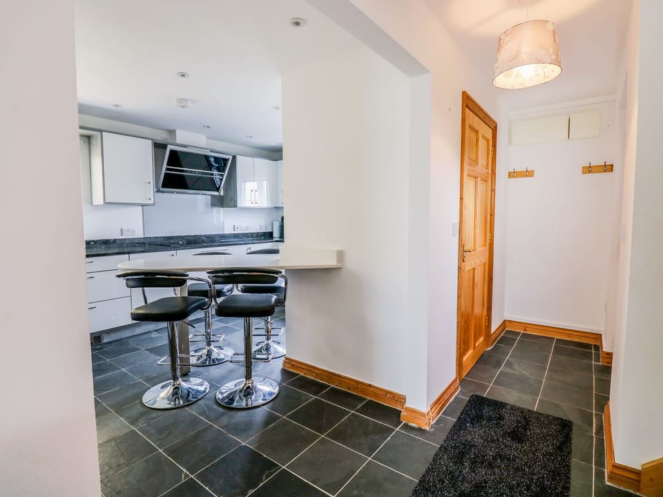 Cottage | Private kitchen | Stovetop, dishwasher, highchair, cookware/dishes/utensils