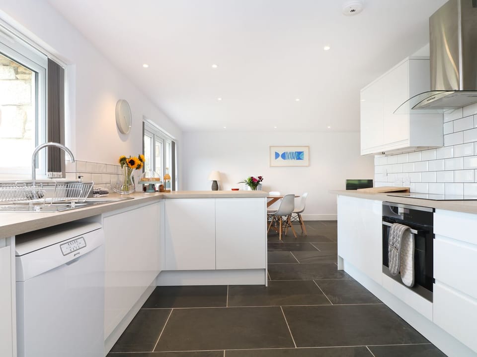 Cottage | Private kitchen | Stovetop, dishwasher, highchair, cookware/dishes/utensils