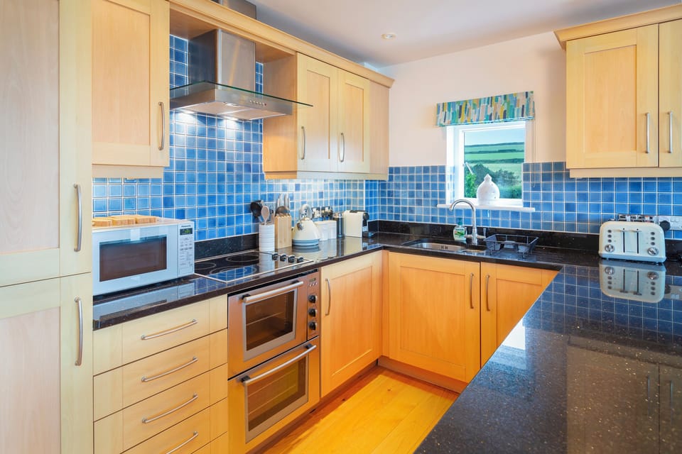 Cottage | Private kitchen | Microwave, stovetop, dishwasher, highchair