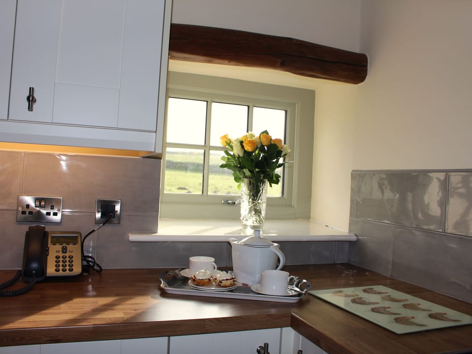 Cottage | Private kitchen | Dishwasher, highchair, cookware/dishes/utensils