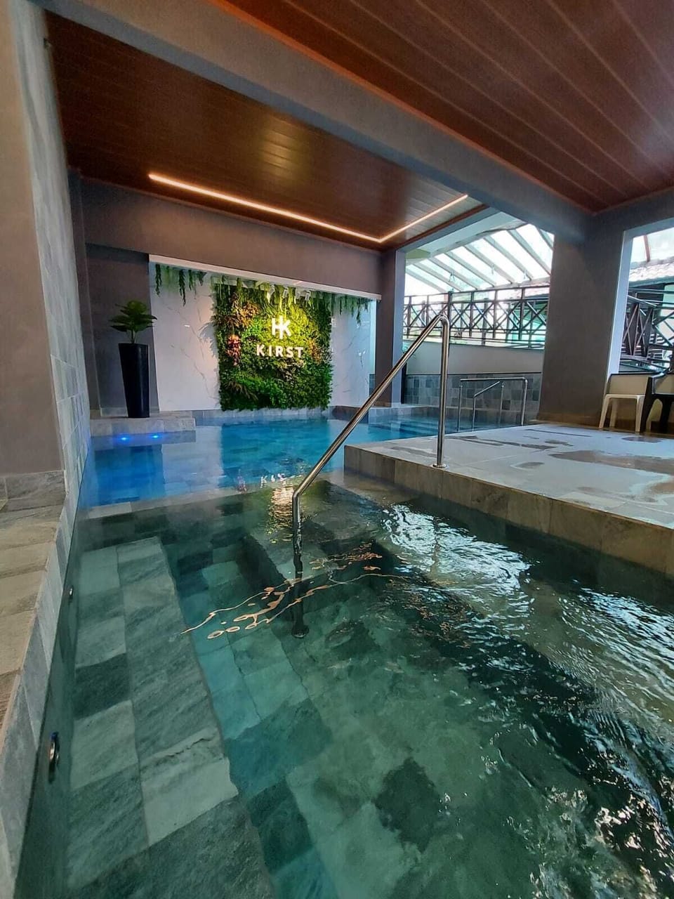 Indoor pool, outdoor pool, pool umbrellas, sun loungers