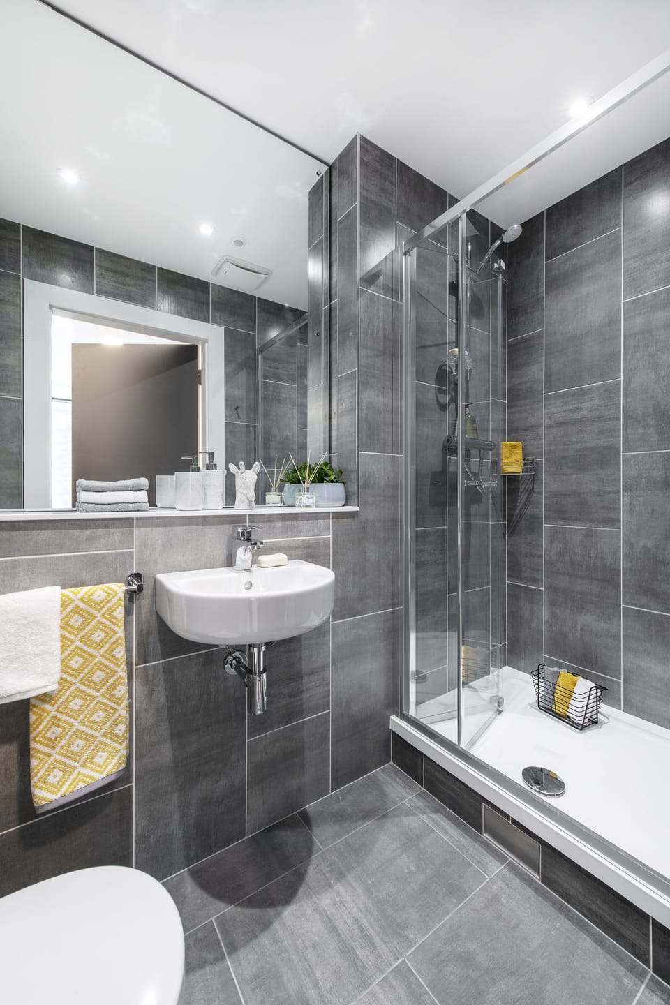 Shower, rainfall showerhead, hair dryer, towels