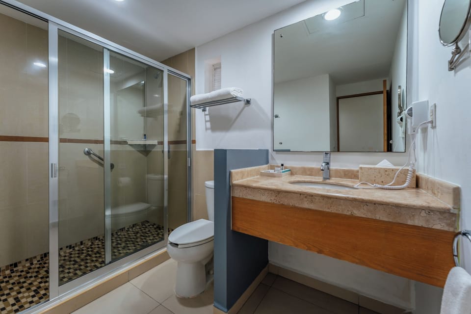 Shower, free toiletries, towels, soap